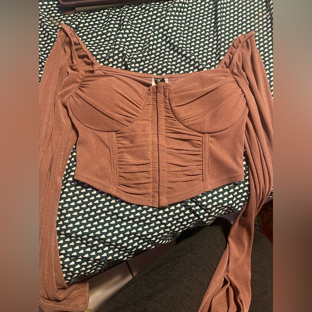 A very pretty sparkly pink shirt size:small